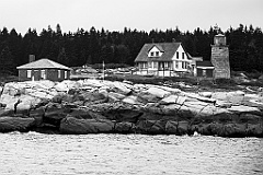 Whitehead Lighthouse on Rocky Edge in Maine -BW